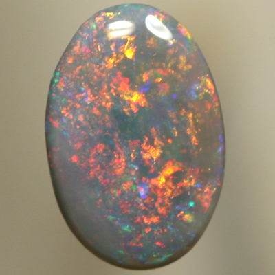 SOLID SEMI BLACK OPAL Sparkles of red/orange over green/blue